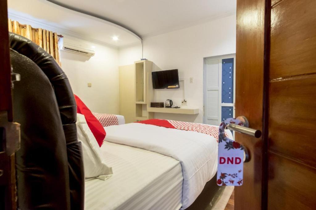 OYO 619 Naufal Guest House Syariah Medan Exterior foto